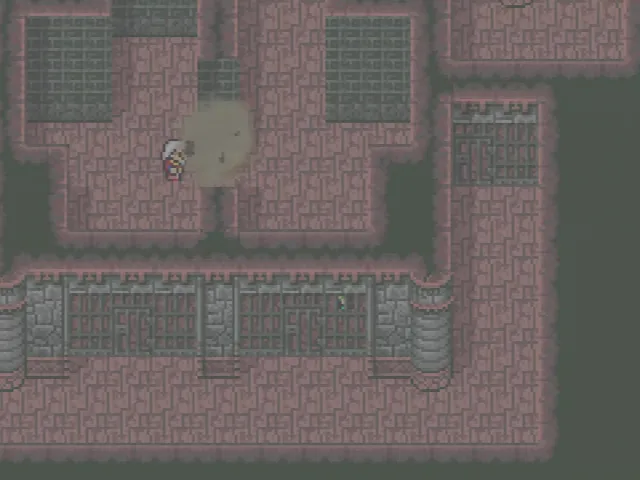 牢の壁を爆破する老人